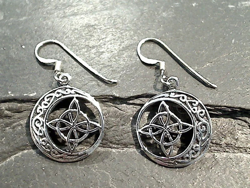 Hoop earrings with braided patterns for a detailed and textured finish-Sterling Silver Celtic Moon And Star Earrings