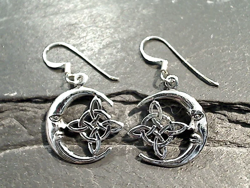 Best hoop earrings with tribal designs for a cultural and exotic aesthetic-Sterling Silver Celtic Moon And Star Earrings