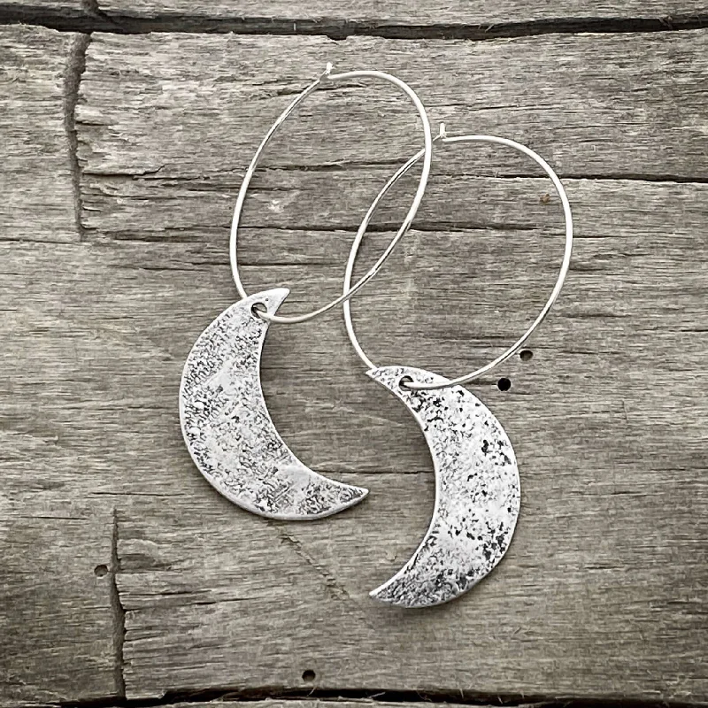 Hoop earrings with snake print designs for an edgy, wild appearance-Crescent Moon Hoop Earrings