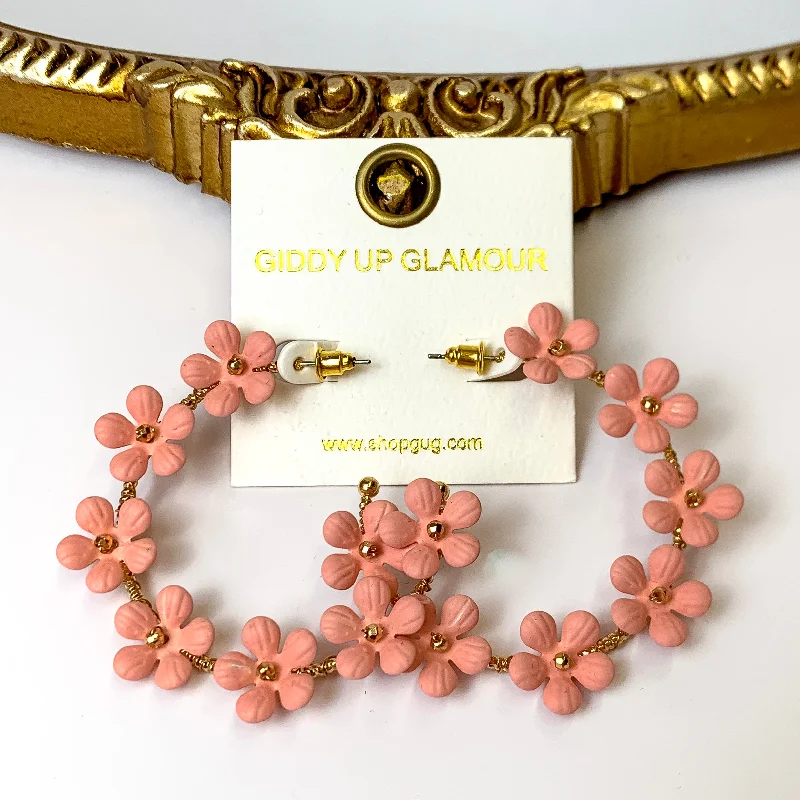 Classic hoop earrings with a thin profile for a sleek and subtle style-Market Flowers Gold Tone Hoop Earrings with Flower Charms in Coral Pink