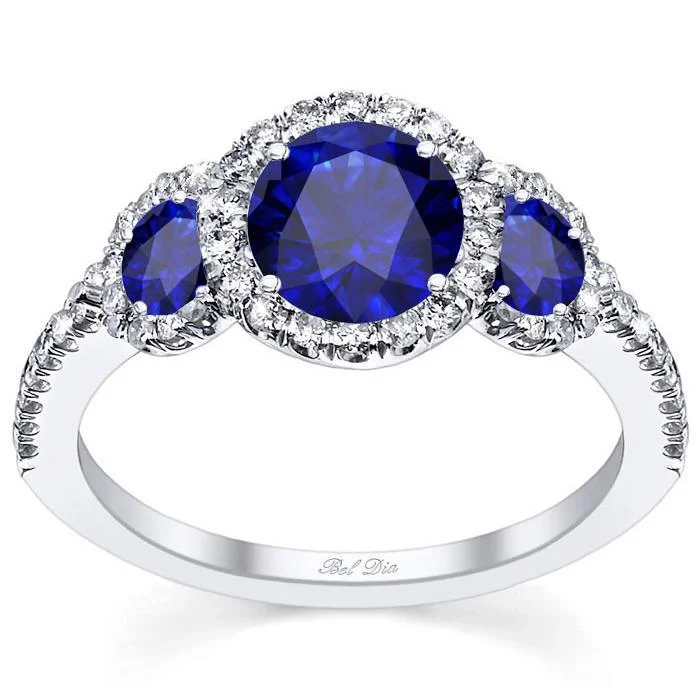 Women’s rings with claw-set jade for security -Blue Sapphire Three Stone Halo Engagement Ring