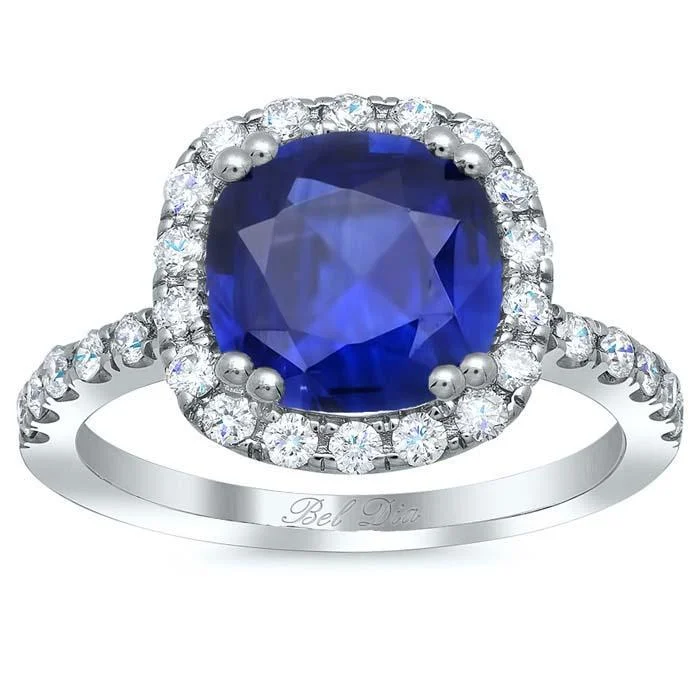 Women’s rings with vine-inspired emerald bands -Cushion Blue Sapphire Pave Halo Engagement Ring