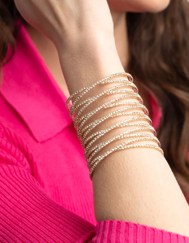 Bangles with polished onyx for bold sleekness -Gold Diamante Cross Over Eight Row Cuff Bracelet