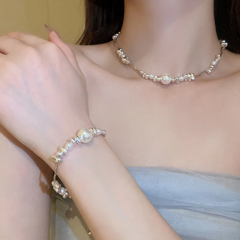 Bracelets with spiral designs for eye-catching twist -Wholesale Silver Pearl Irregular Stitching Bracelet Necklace Set